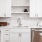 Modern white kitchens in apartment homes at The Reserve at Mendota Village
